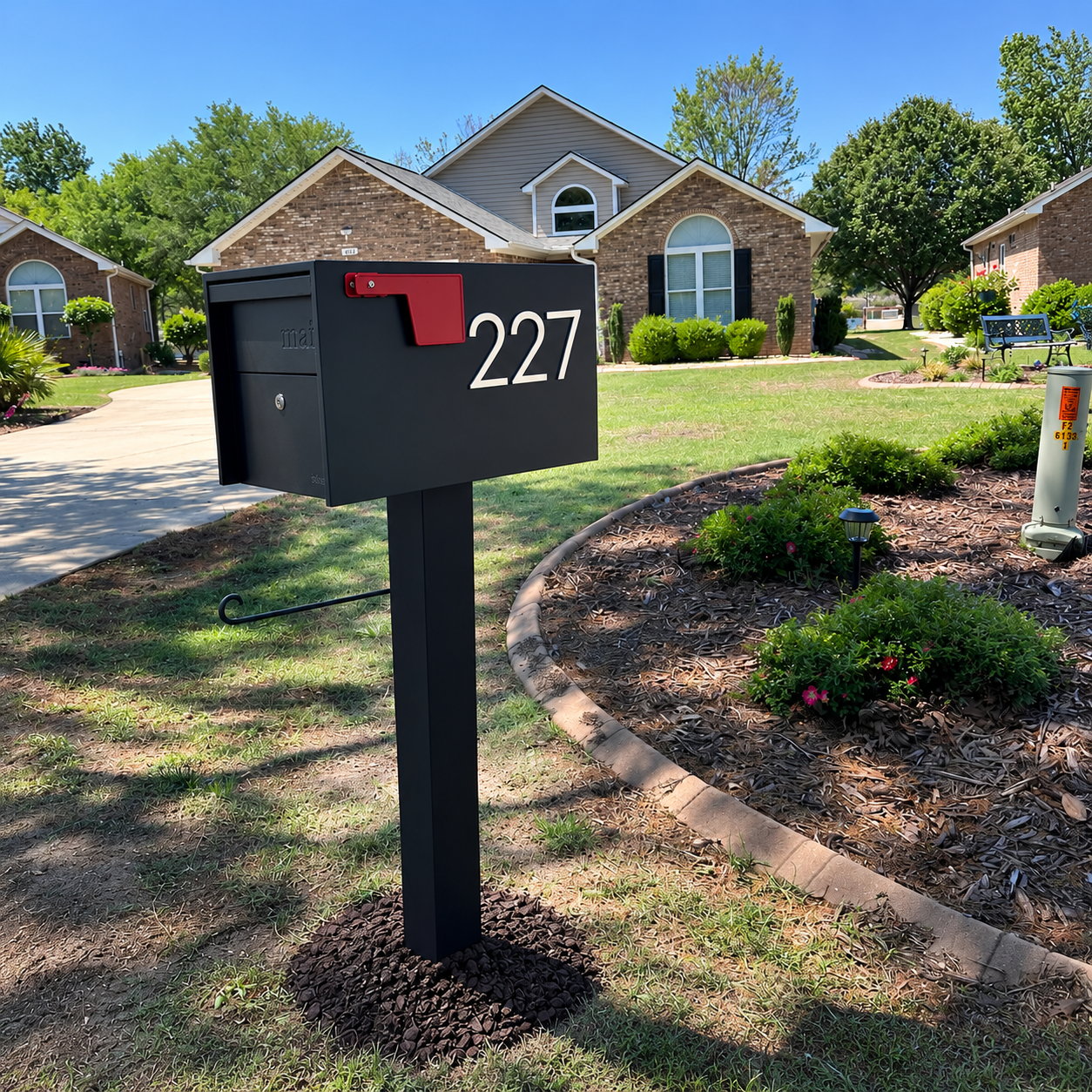 Mr Box black steel mailbox and metal post with white address numbers