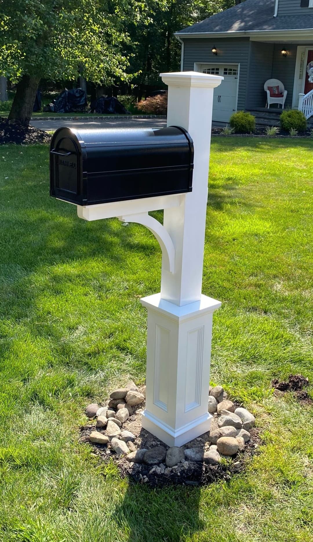 Mr Box premium white vinyl mailbox post with decorative bracket and paneled base